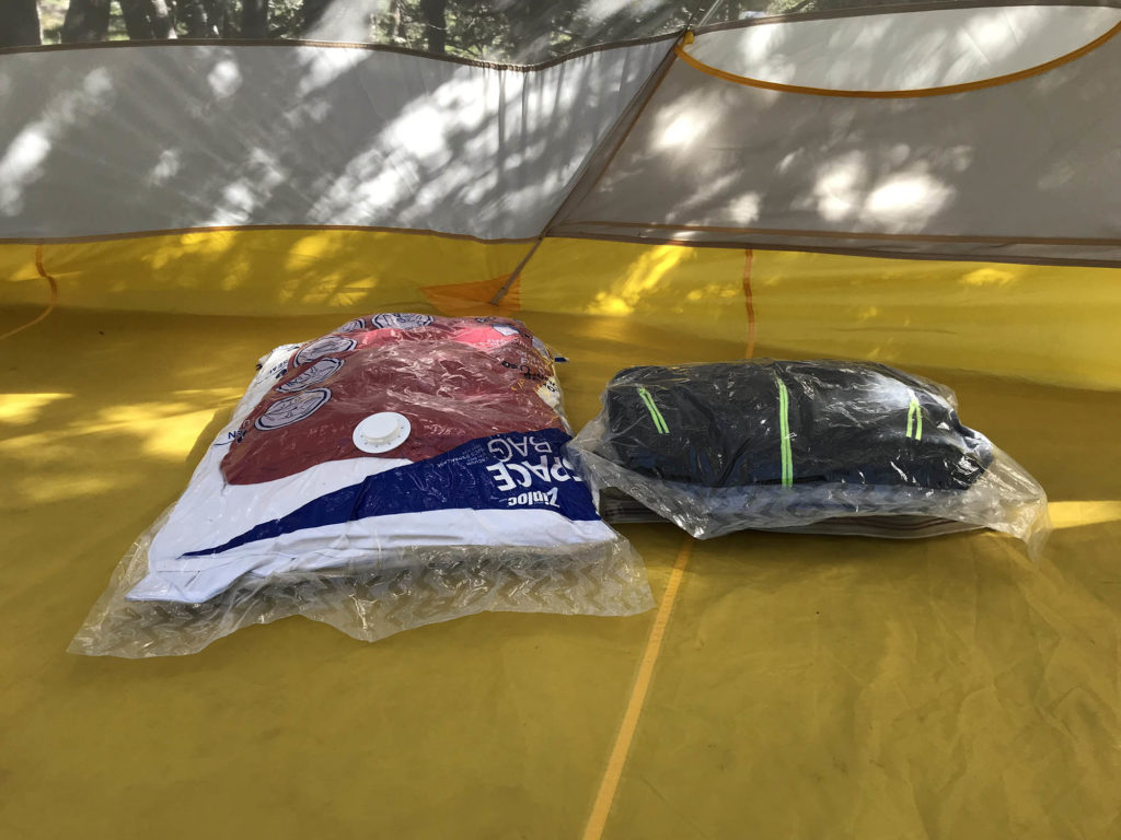 Clothes packed compactly in vacuum space bags